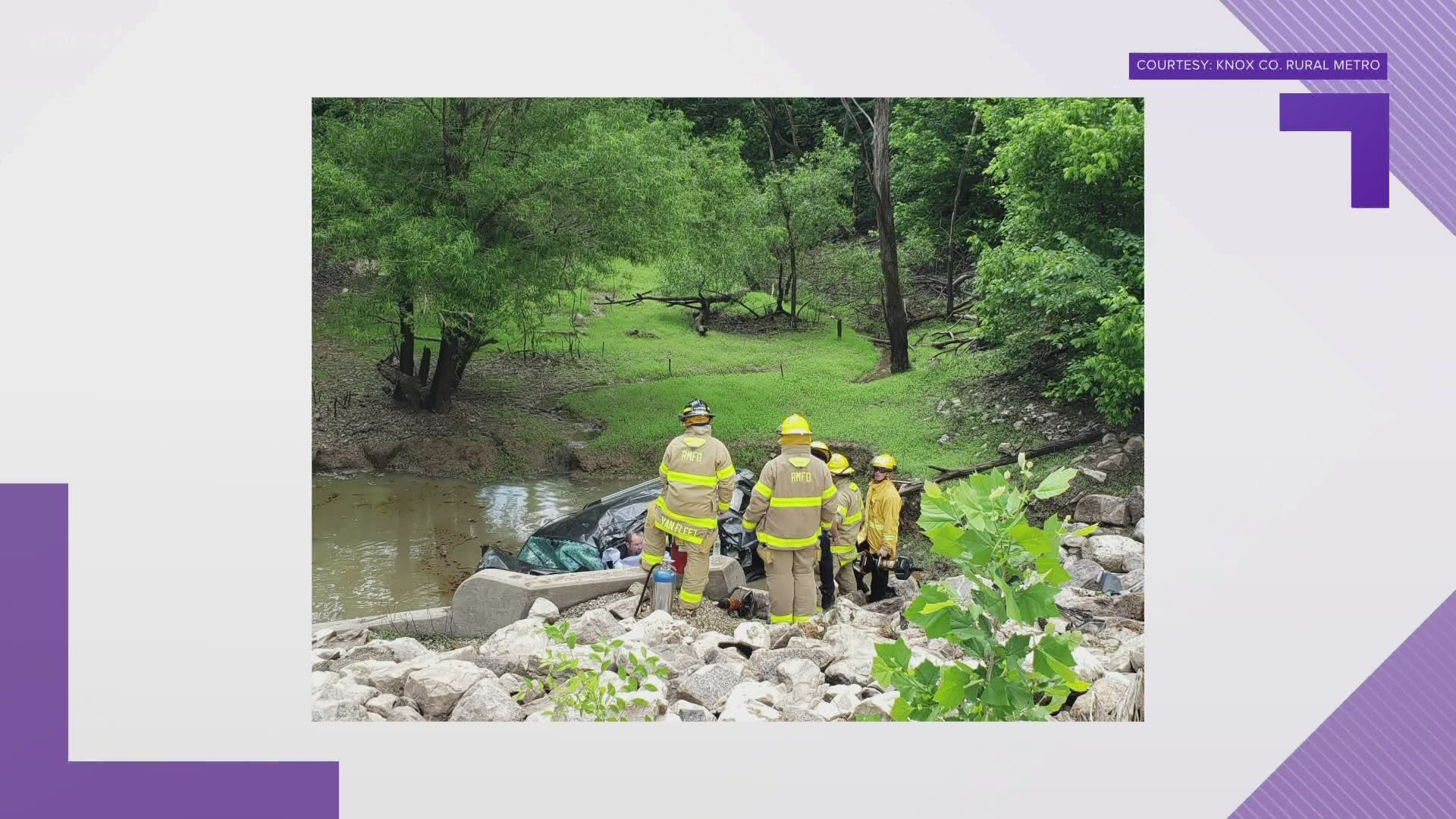 One car was on the road with damage to the front of the car, and an SUV had rolled over several times into a pond.