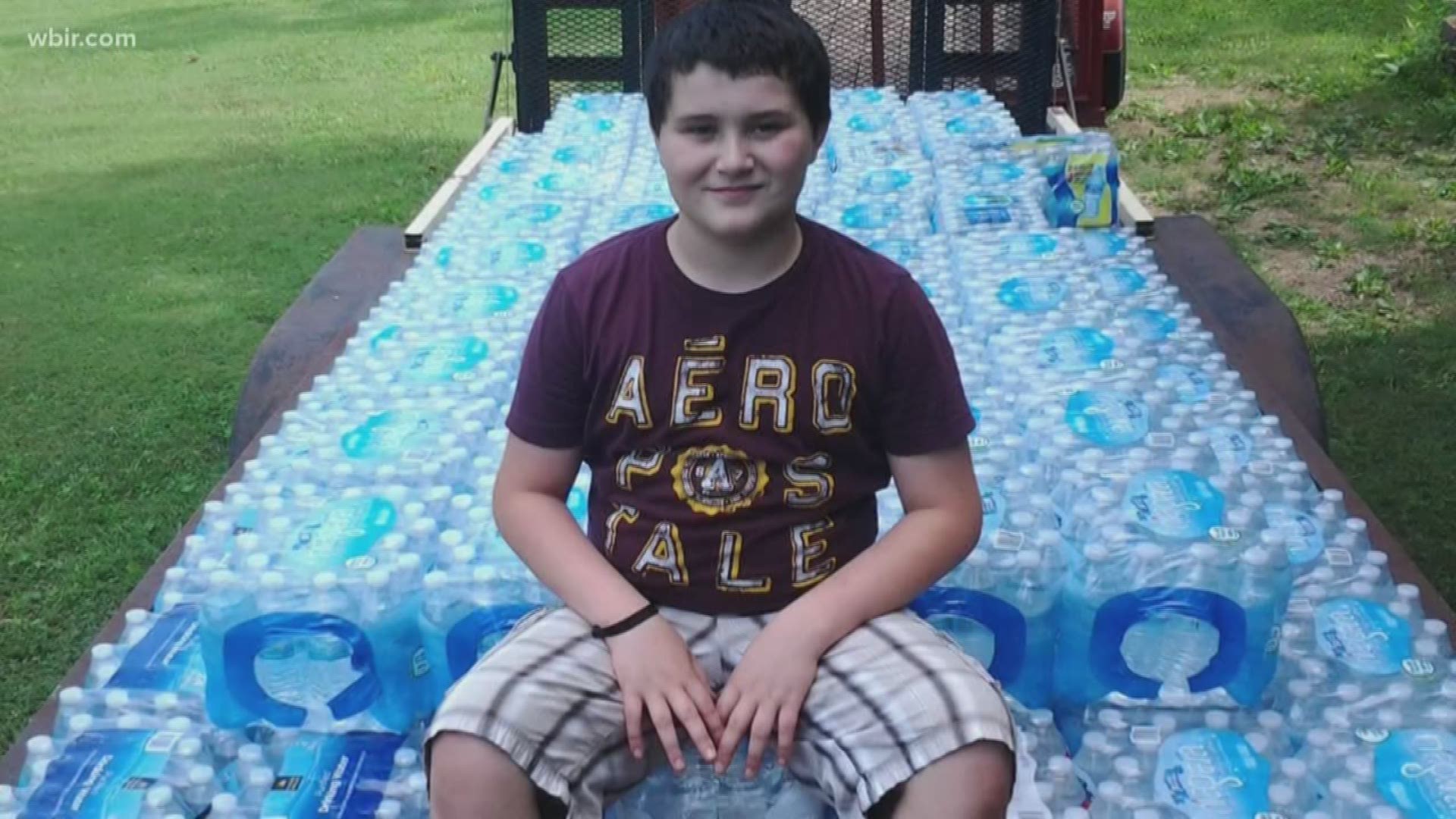 Nick Bryant collects water for Knoxville Area rescue Ministries.