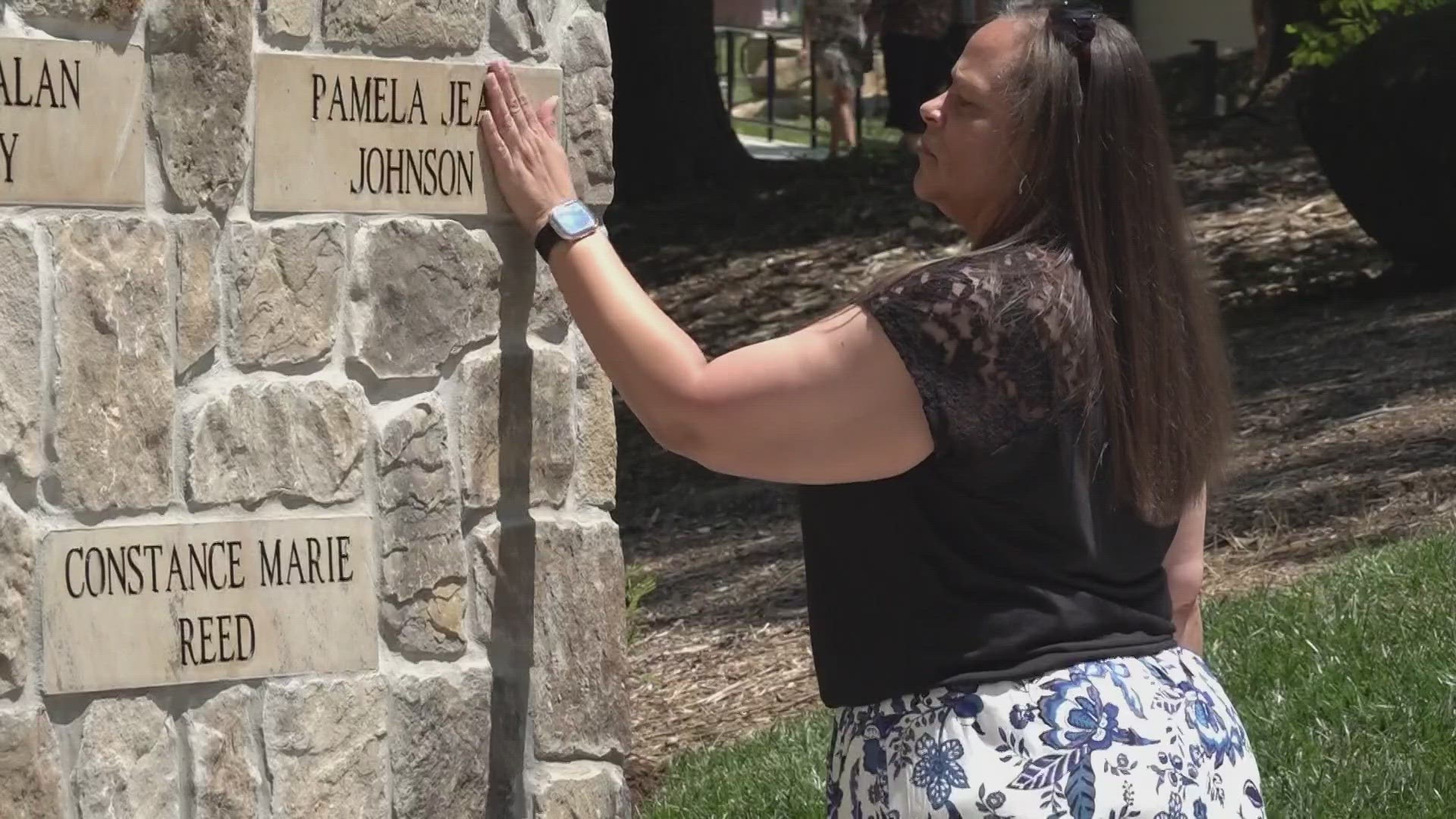 New plaques on a memorial wall are dedicated to the 14 people who died in the tragedy and the first responders who helped save many more.