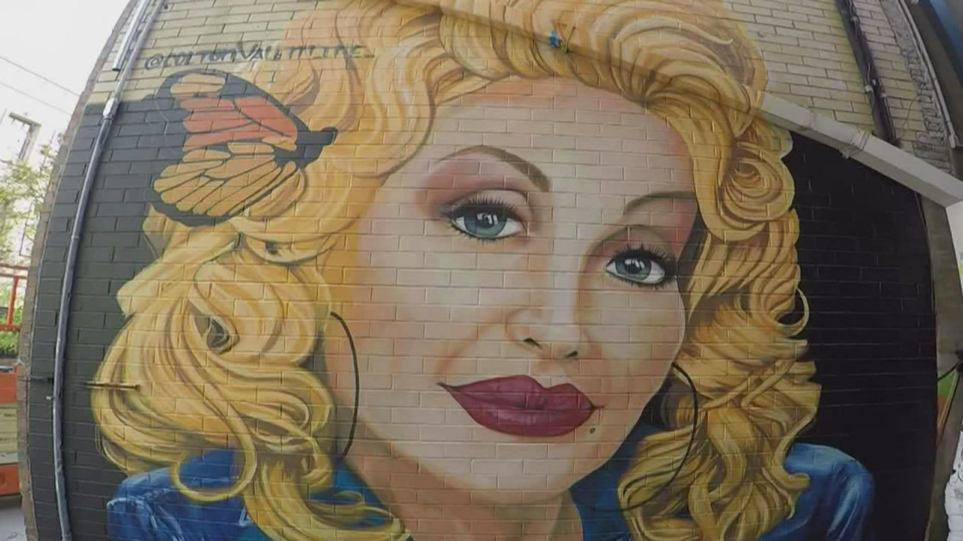 Restoration on the Dolly Parton mural in Downtown Knoxville is now finished after it was vandalized last week.