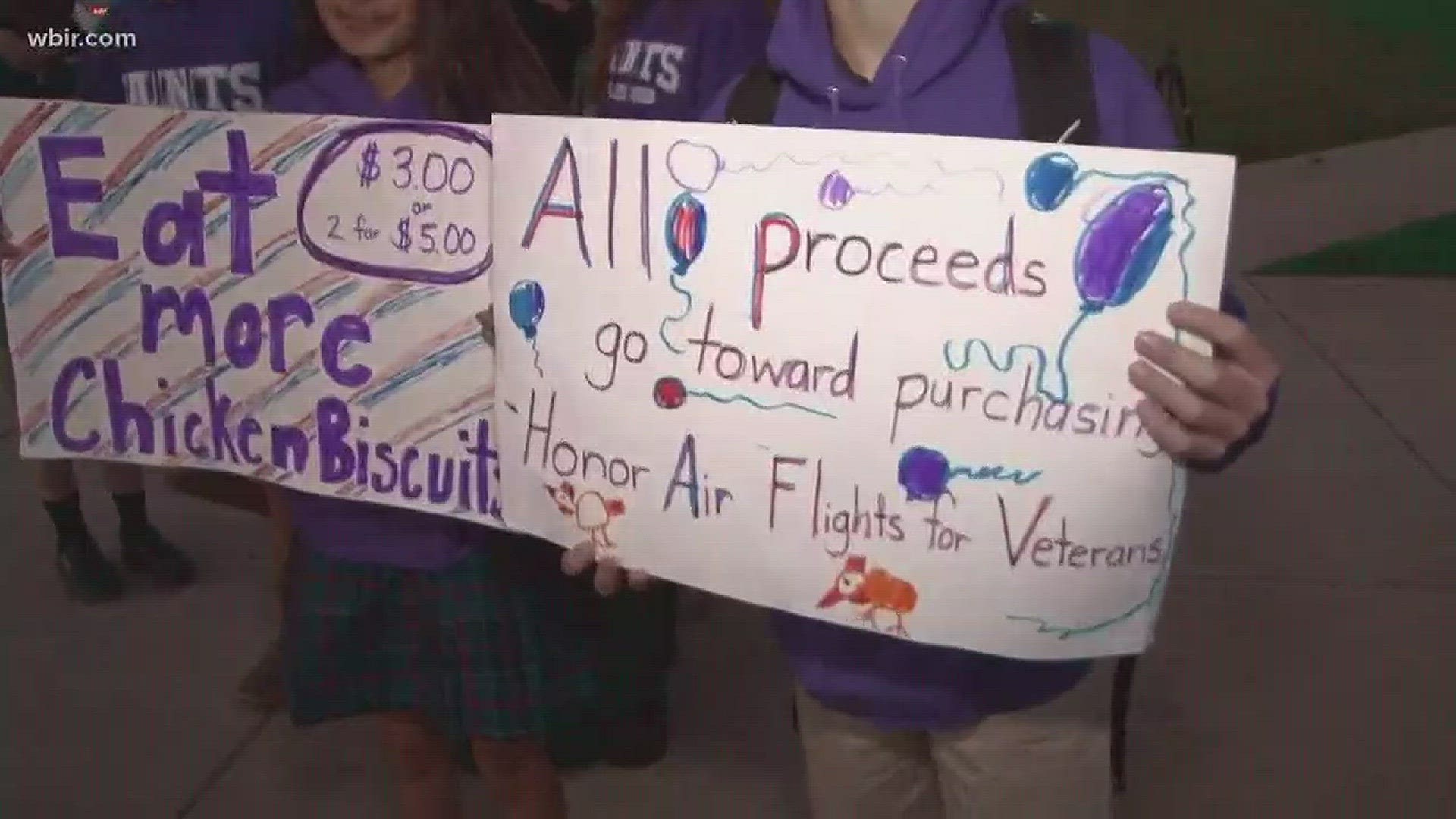The Eighth Grade Interact Club sells chicken biscuits each Friday before school. They hope to send four veterans on the flight, which would cost around $2,000.