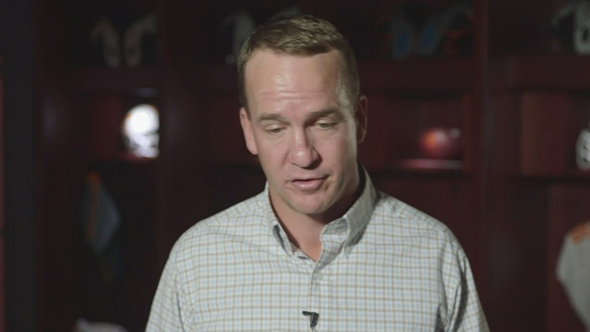 Peyton Manning is back in Knoxville for the Tennessee-Georgia game. He doesn't like being asked to analyze Tennessee football. He says he's a fan and is behind Butch Jones.