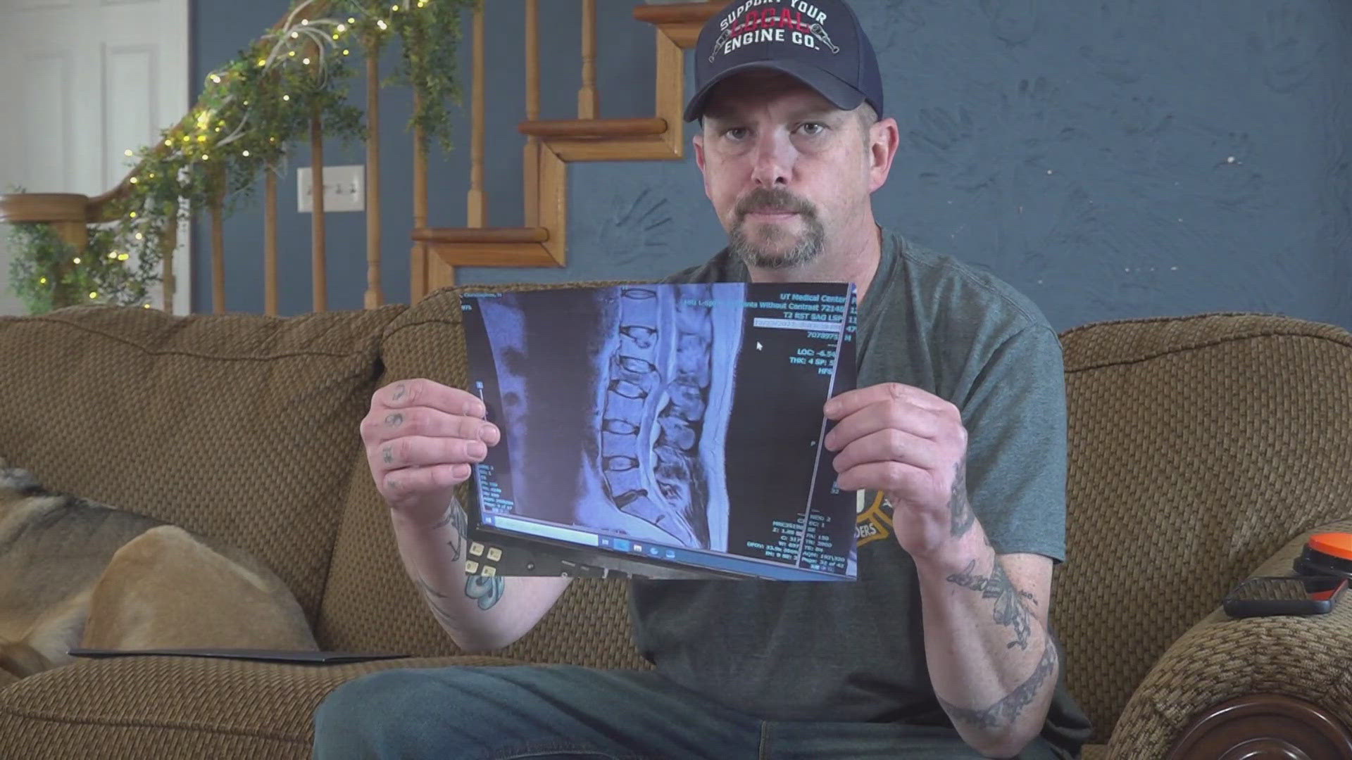 Chris Patterson responded to a house fire in 2022 when the ladder he was on gave way and he fell and broke his back.