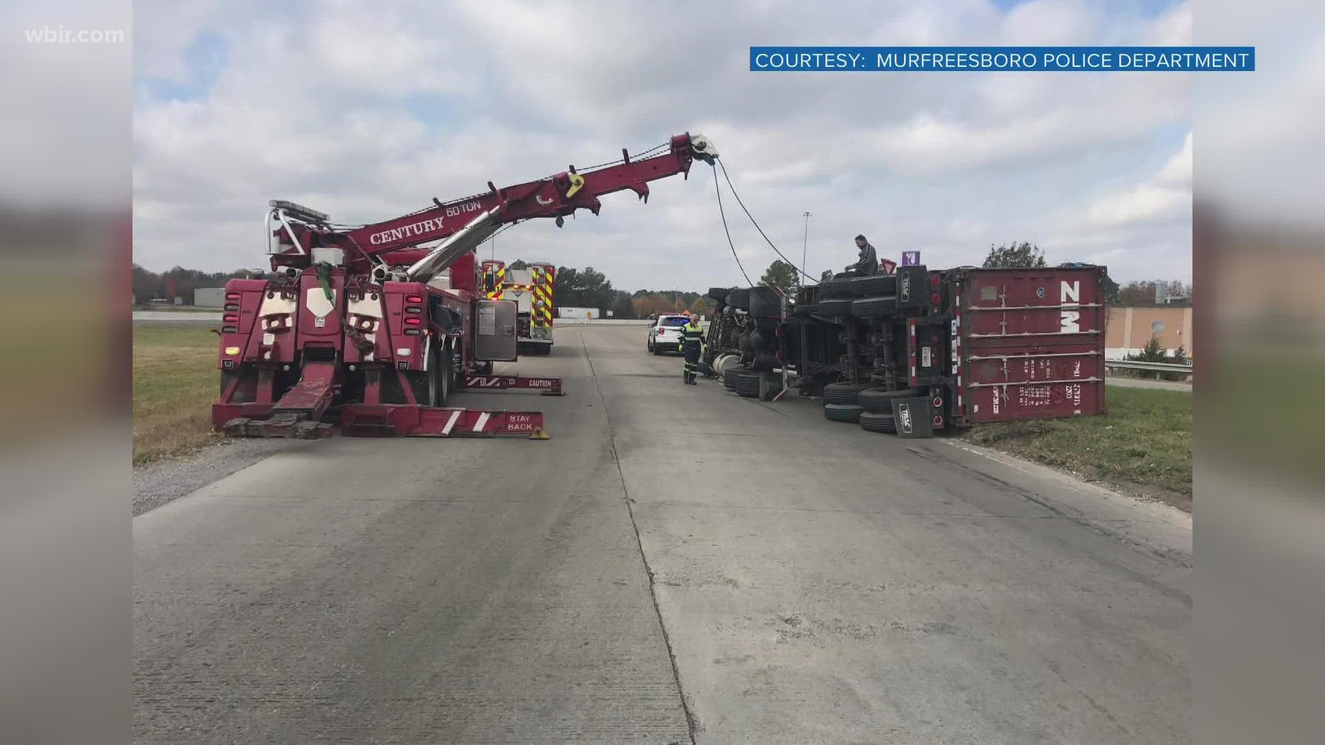 The truck was filled with $400,000 worth of Jack Daniel's whiskey and overturned while the driver was turning left onto the I-24 on-ramp.