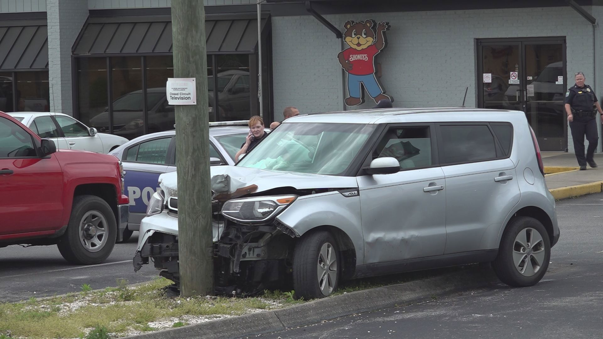 The Knoxville Police Department said officers tried to stop the car when it crashed outside the restaurant Tuesday afternoon.
