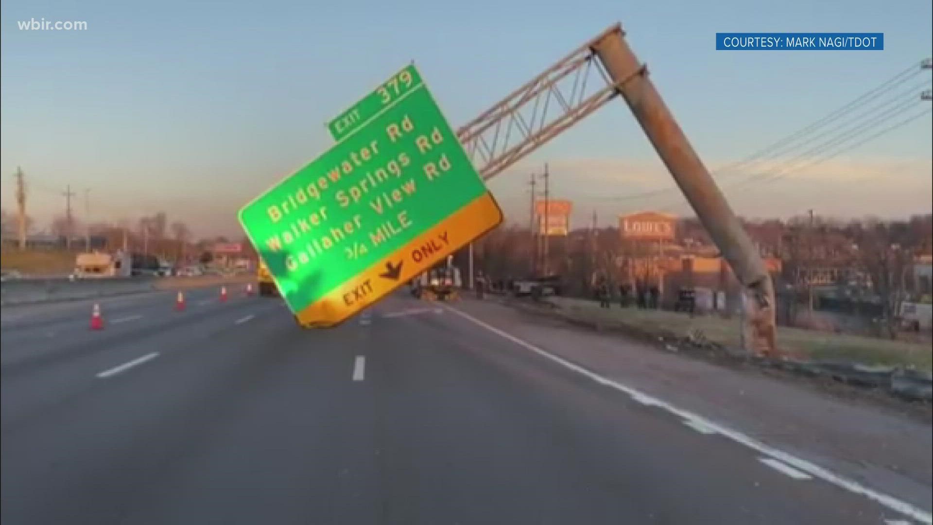 A portion of the pole holding up the sign had been severely damaged by a crash.