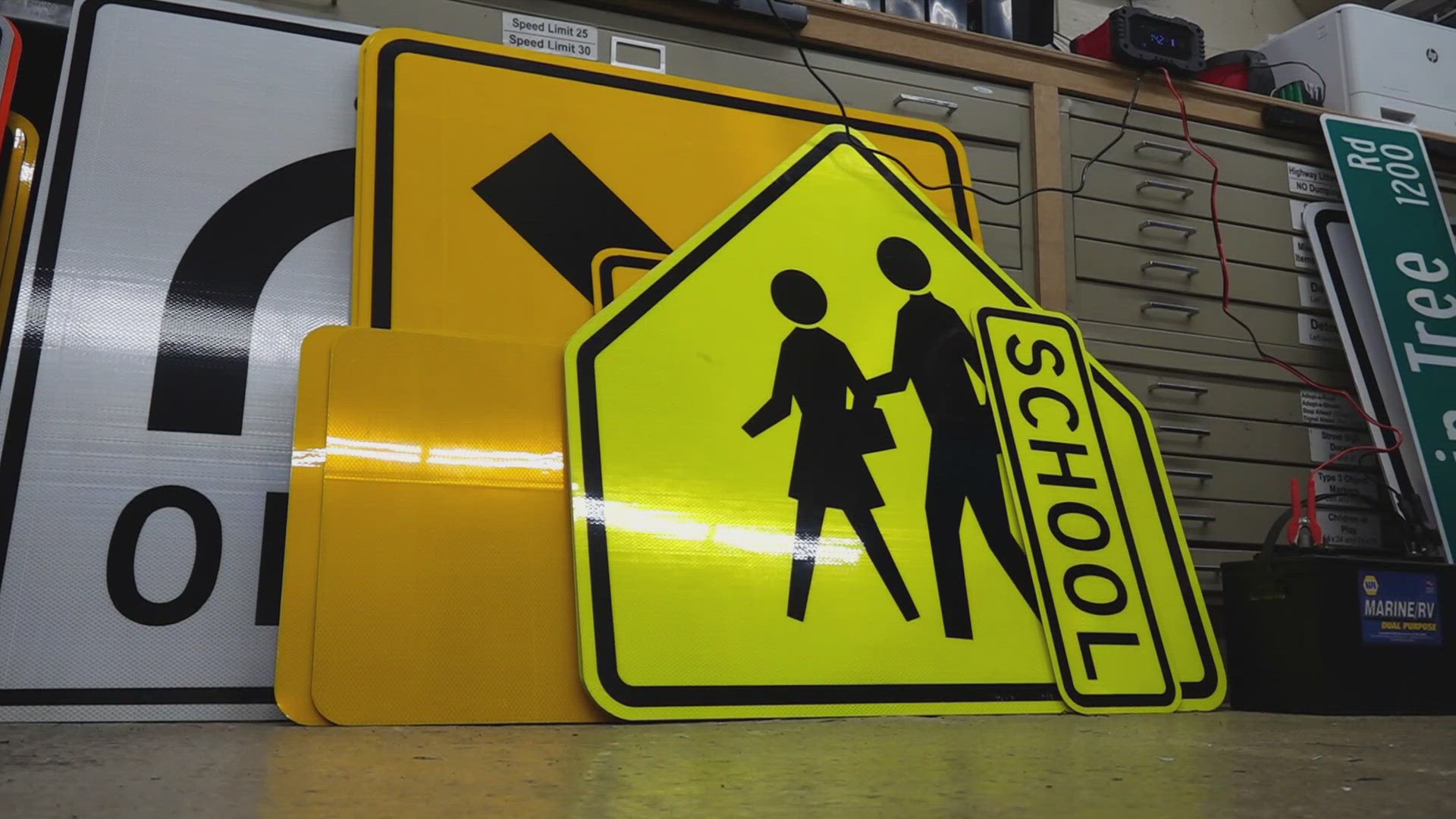 The county's Public Works Department has its own building dedicated to making signs. 