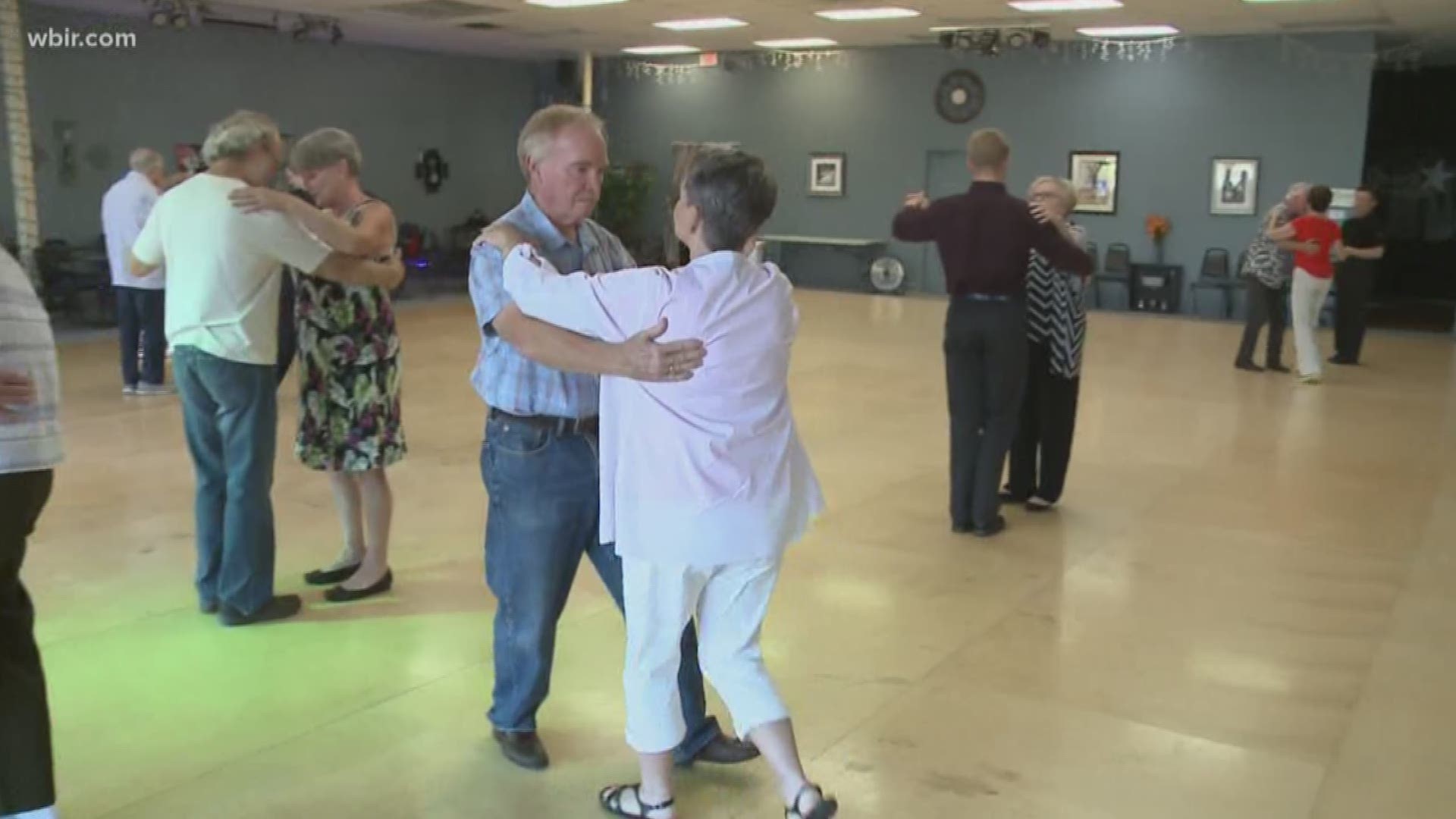People put down their canes and pick up their feet to take a spin on the dance floor at Dance Tonight Knoxville.