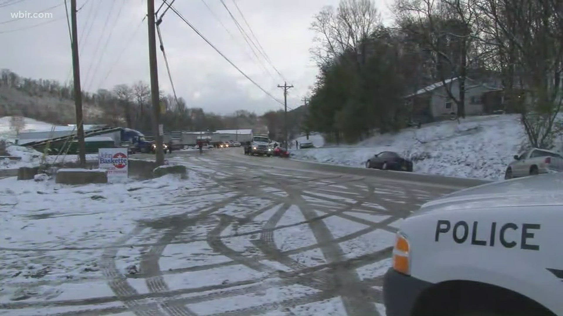 Cars were off the road in many places because of icy conditions.