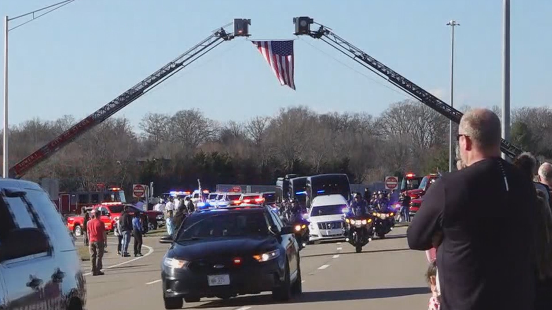 Flags lined the roads in Blount and Knox counties along the procession route and were at half-staff across the state to honor McCowan and his family.