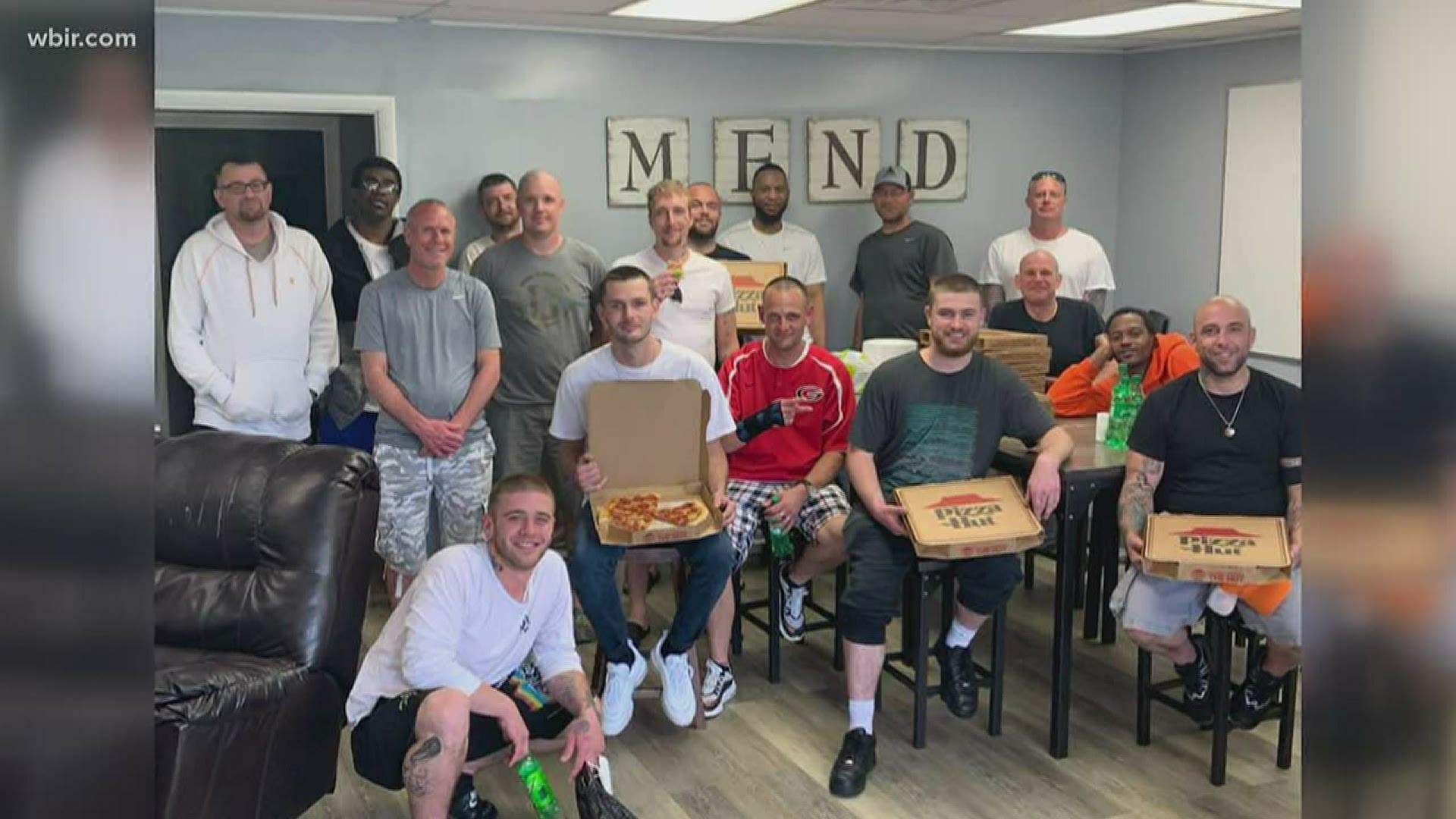 Preston Arnwine with Pizza Hut fed some 25 men who are getting treatment at the Mend House, a sober living community in Knoxville.