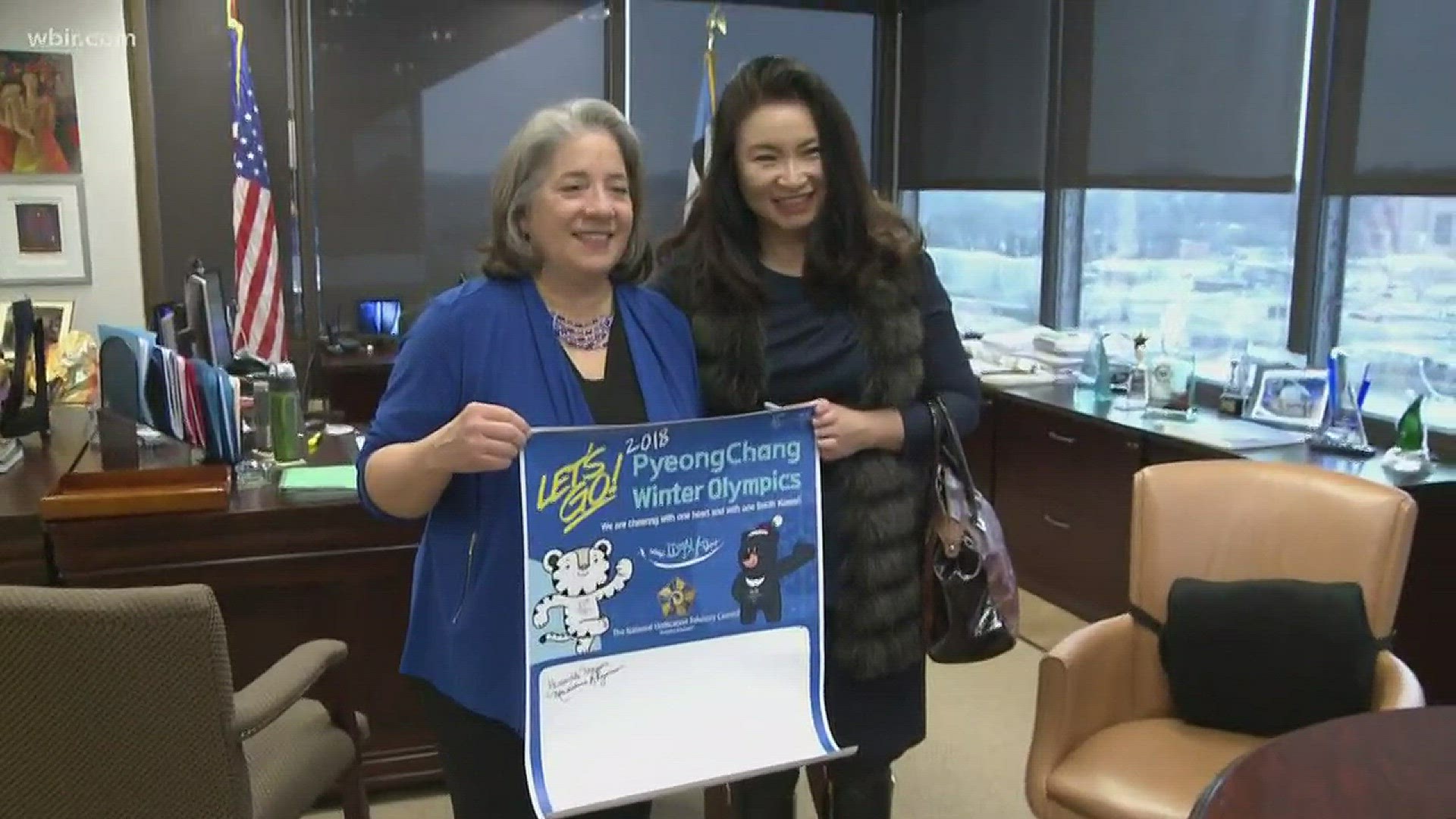 Knoxville Mayor Madeline Rogero signs a poster from the Knoxville Area Korean Association to join them in promoting a peace Winter Olympics in South Korea this February.January 22, 2018-4pm