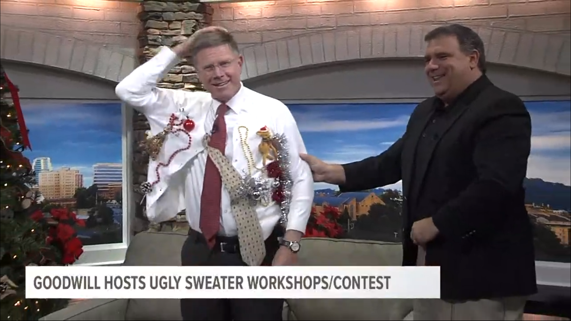 Russell gives Todd a Christmas sweater he designed specifically for him. Visit for more on the Goodwill Ugly Sweater workshop & contest. Dec. 2, 2019-4pm.