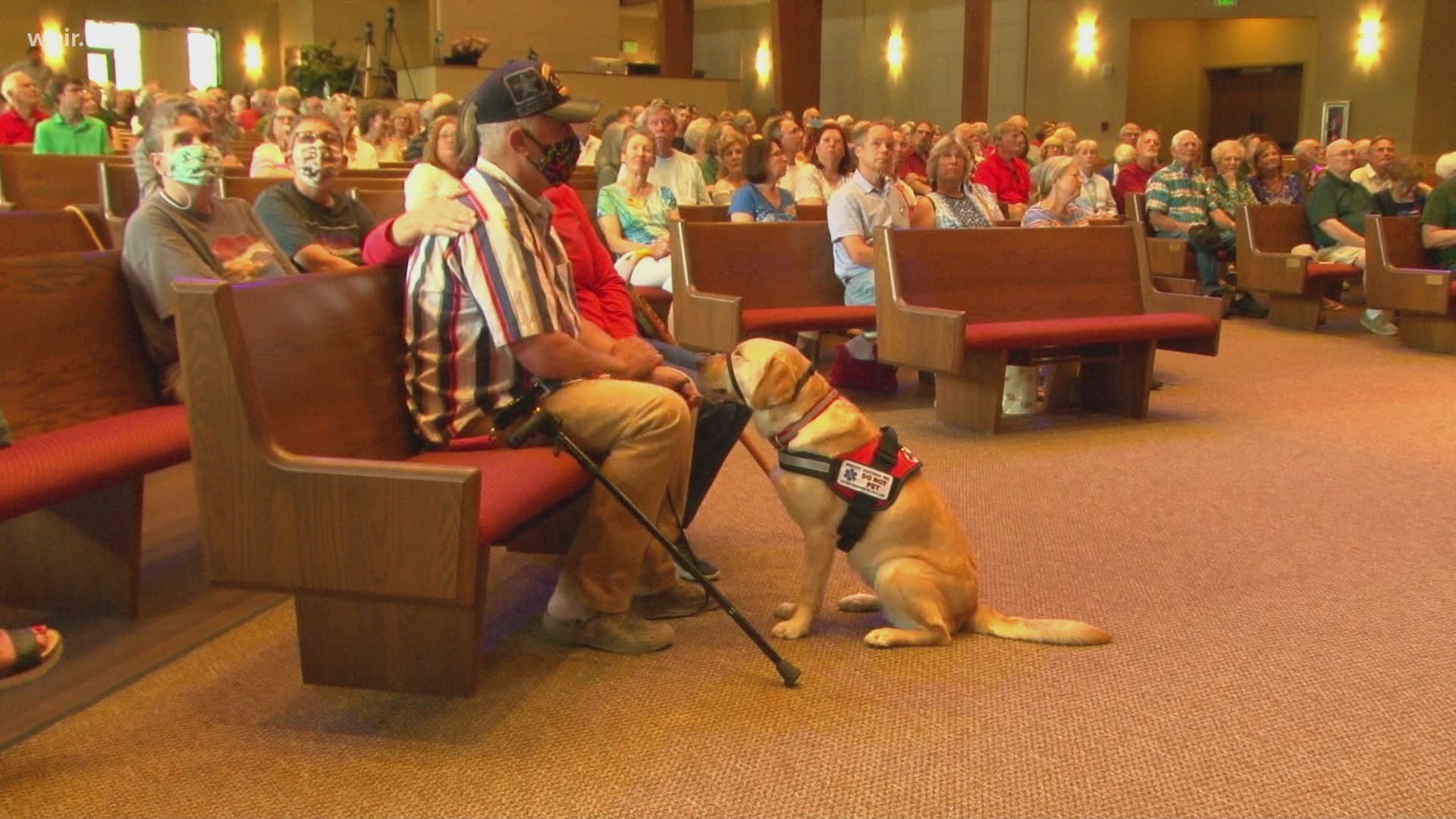 Smoky Mountain Service Dogs passed a leash to US Army Sergeant first class Veteran Timmy Moyers.