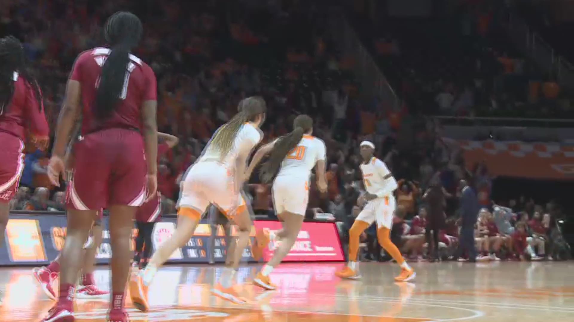 Lady Vols guard Rennia Davis nailed a high-arcing shot with less than one second remaining to lift Tennessee over Alabama, 65-63.