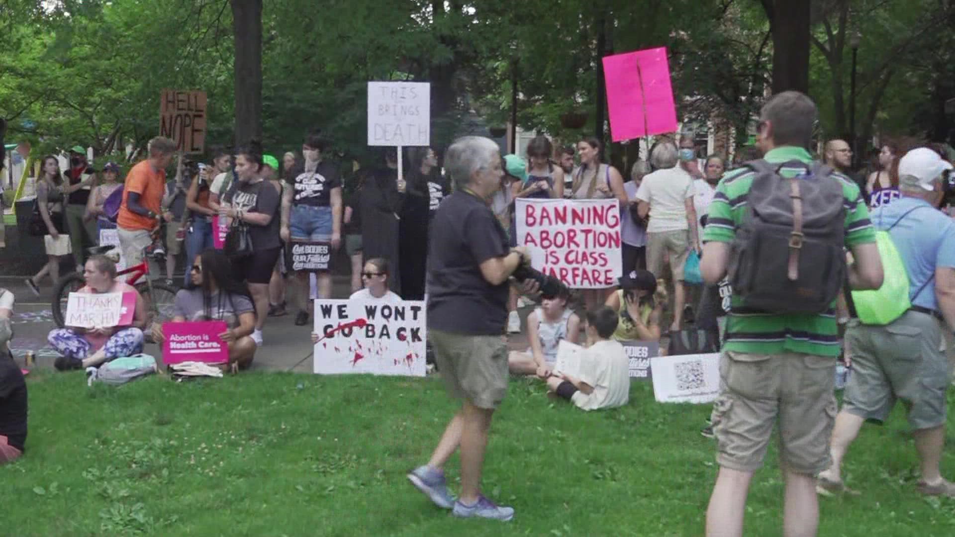 Several groups, including Advocates for Planned Parenthood, gathered in downtown Knoxville after learning Roe v. Wade was overruled.