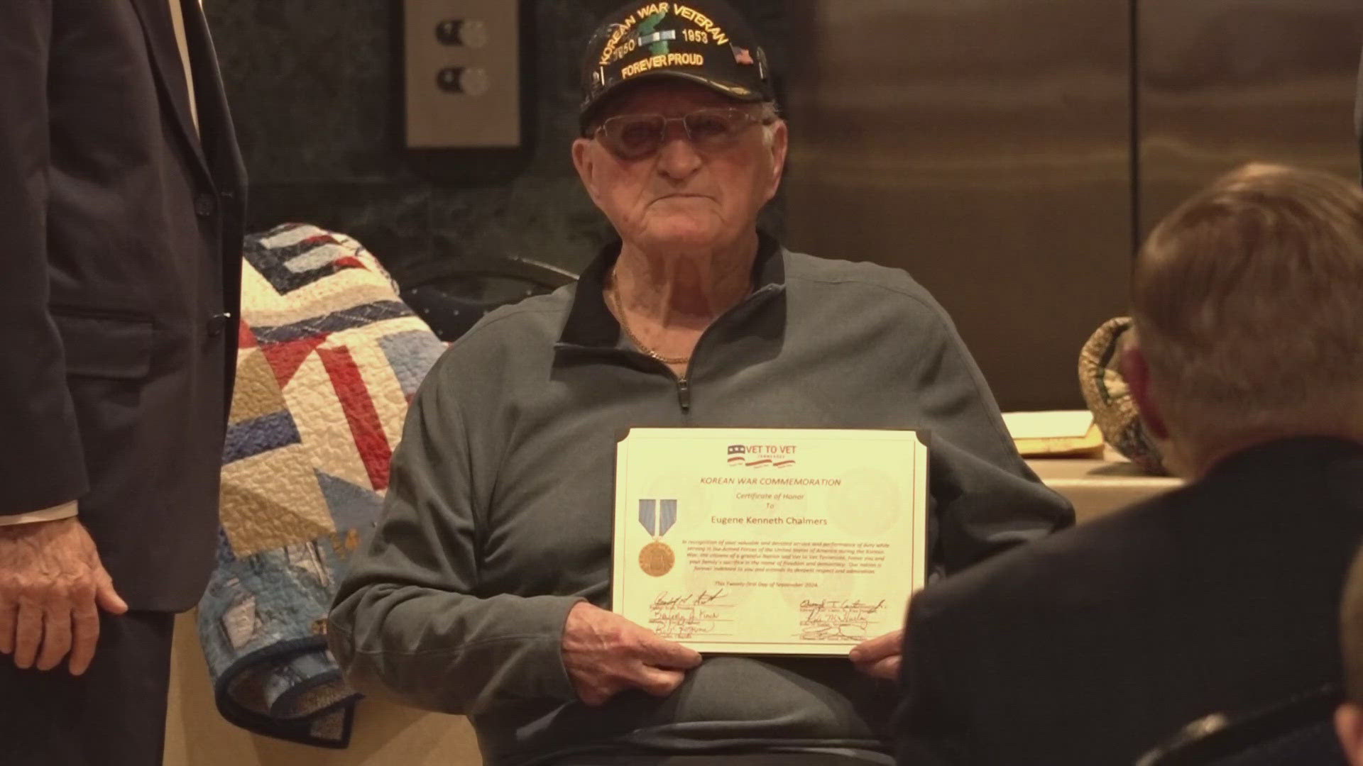 Eugene Chaimers was surrounded by friends and family as he received the medal.