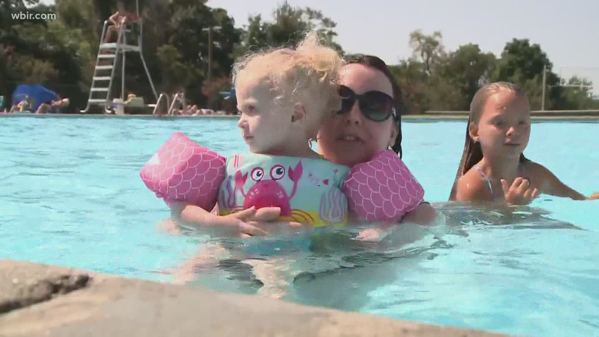 The CDC says kids should still wear a mask when they are not in the pool or when eating or drinking.