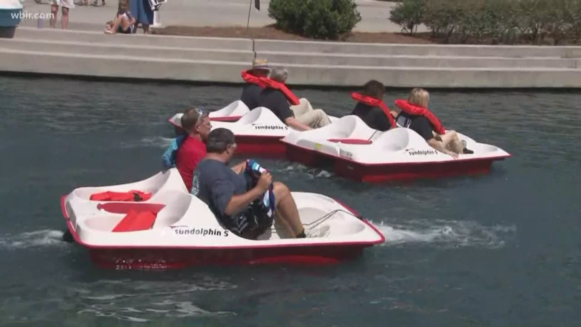 Russell & Todd take on members of the Knoxville Fire Department and Knoxville Police Department in a paddle boat race at World's Fair Park. Beth and local radio personality Frank Murphy help call the race.July 4, 2018-4pm