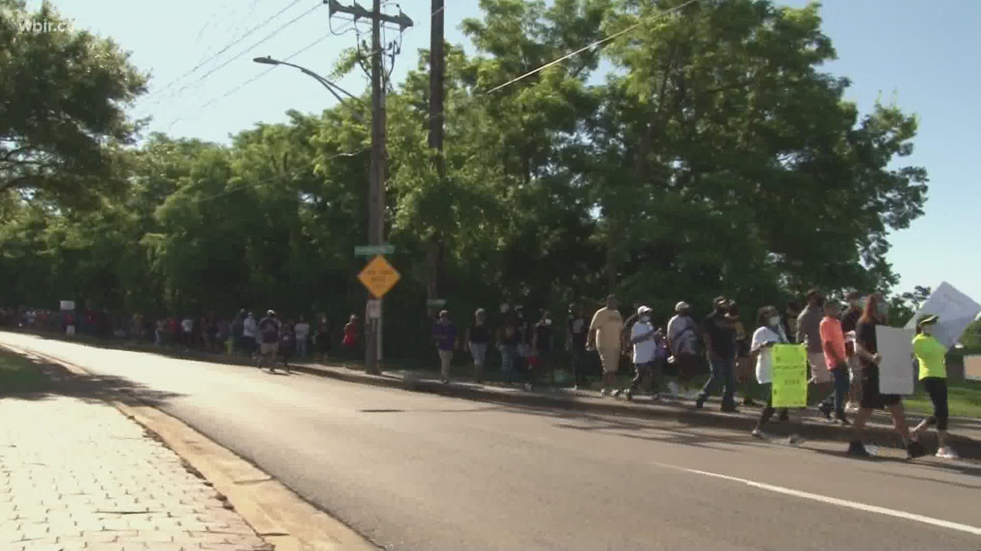 Protestors marched through downtown Knoxville to Market Square where they paused and kneeled for 8 minutes and 46 seconds to honor the death of George Floyd.