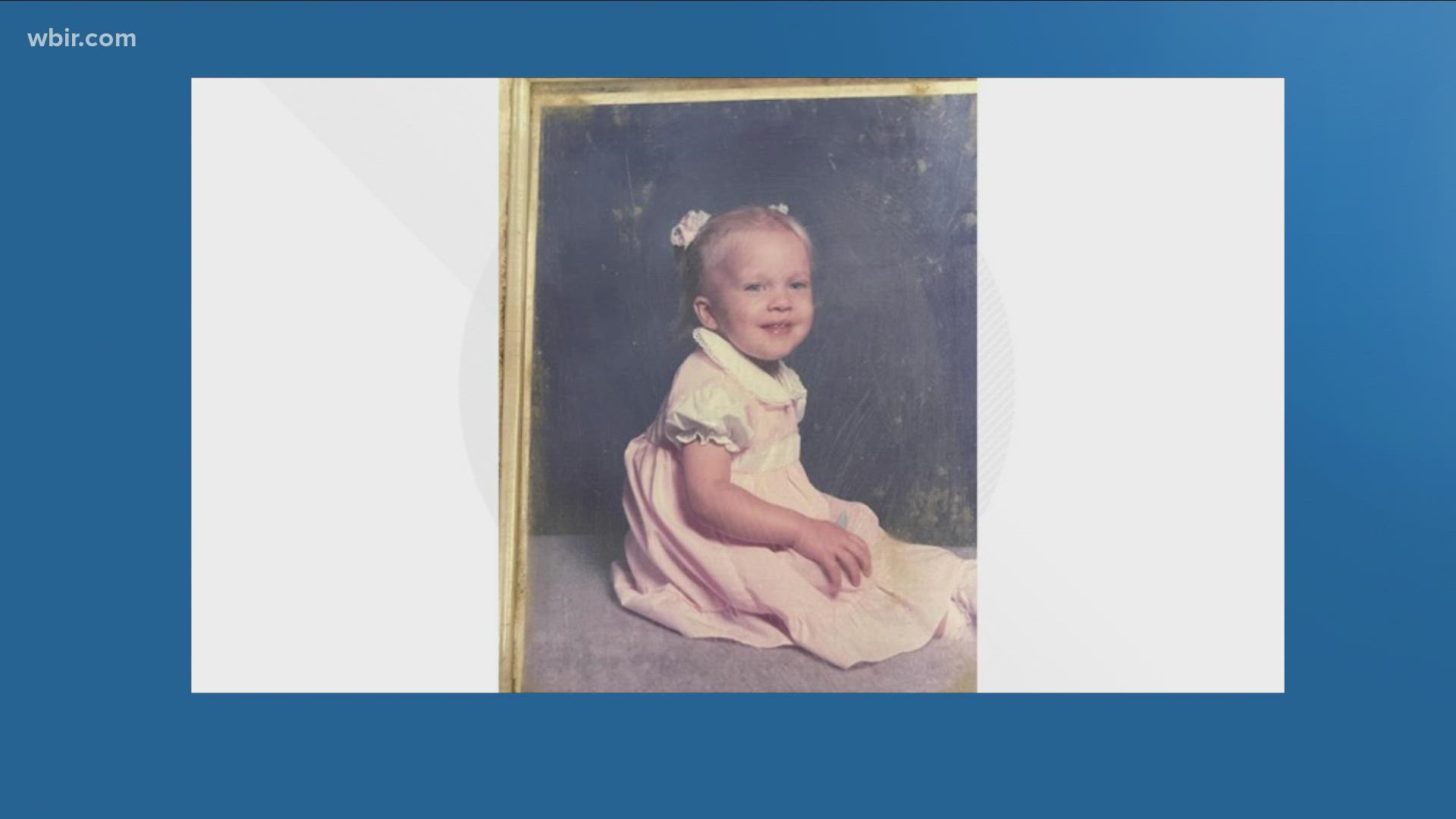 The family had purchased property in Kodak with a burned down house. While searching through the wreckage, they found the picture of the young girl.