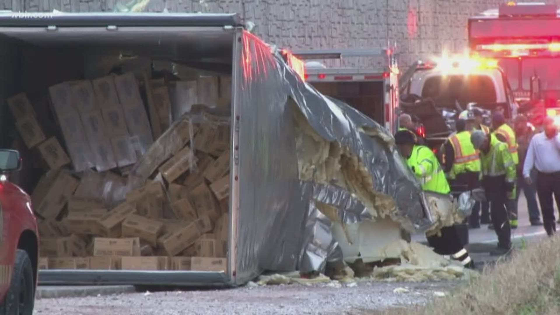 A tractor-trailer overturned on I-40 East Friday morning, blocking an off-ramp near Papermill Road.