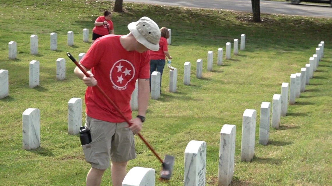 Groups gather to clean veteran headstones at East TN State Veterans