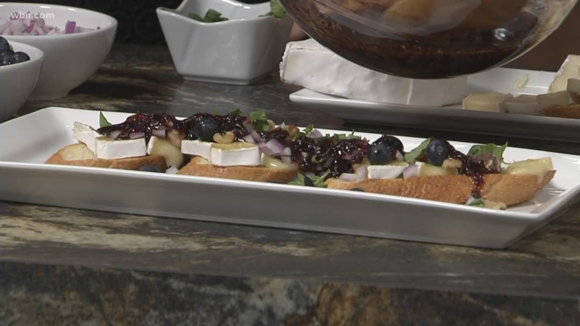 Chef Gary Nicely with Naples Italian Restaurant whipped up a blueberry brie walnut crostini.
