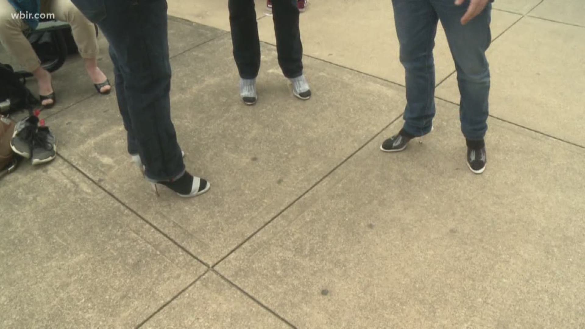 UT students hiked the Hill in heels today to raise awareness for sexual assault.