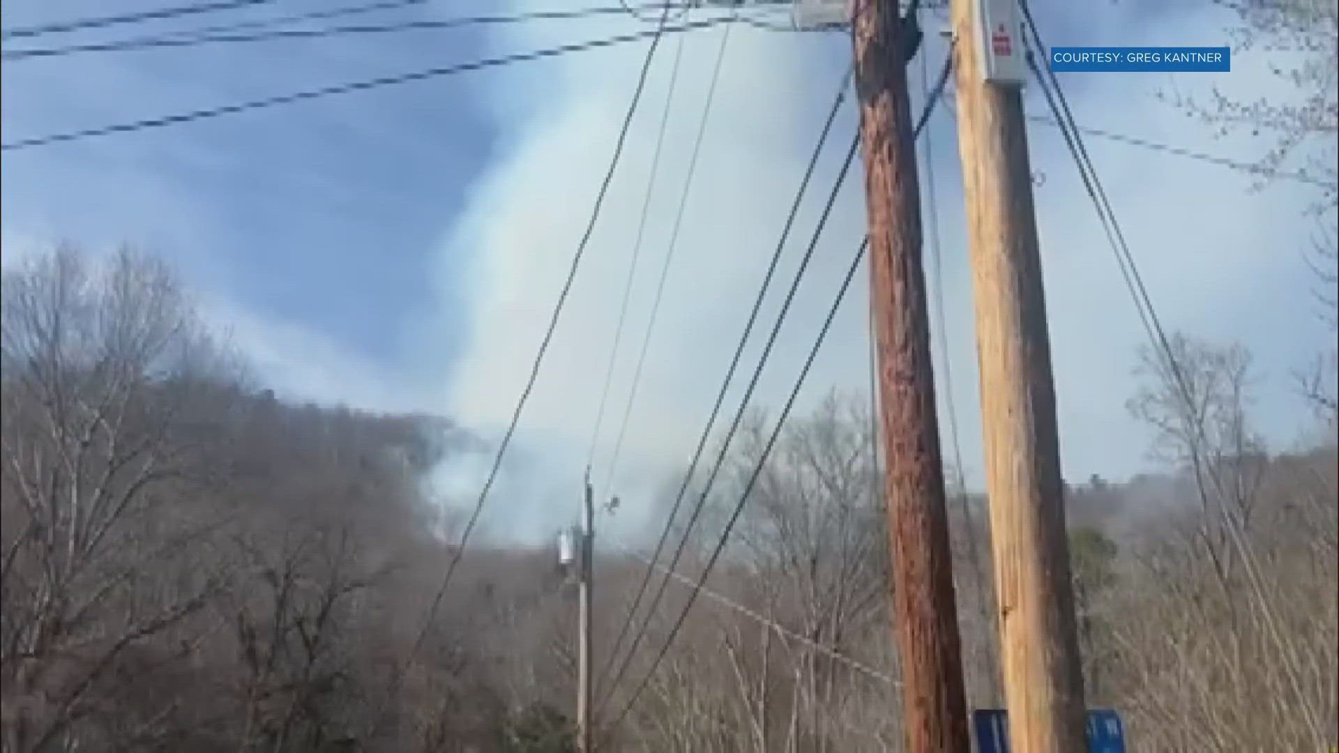 The LaFollette Fire Chief asked people to avoid the area of N. 19th Street while crews worked. The structures were on N. 21st Street.