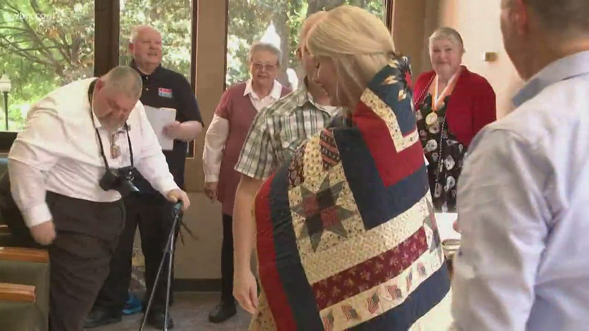 Volunteers held a ceremony at Hodges Library today. This is the first time they've handed out quilts to female veterans at UT.