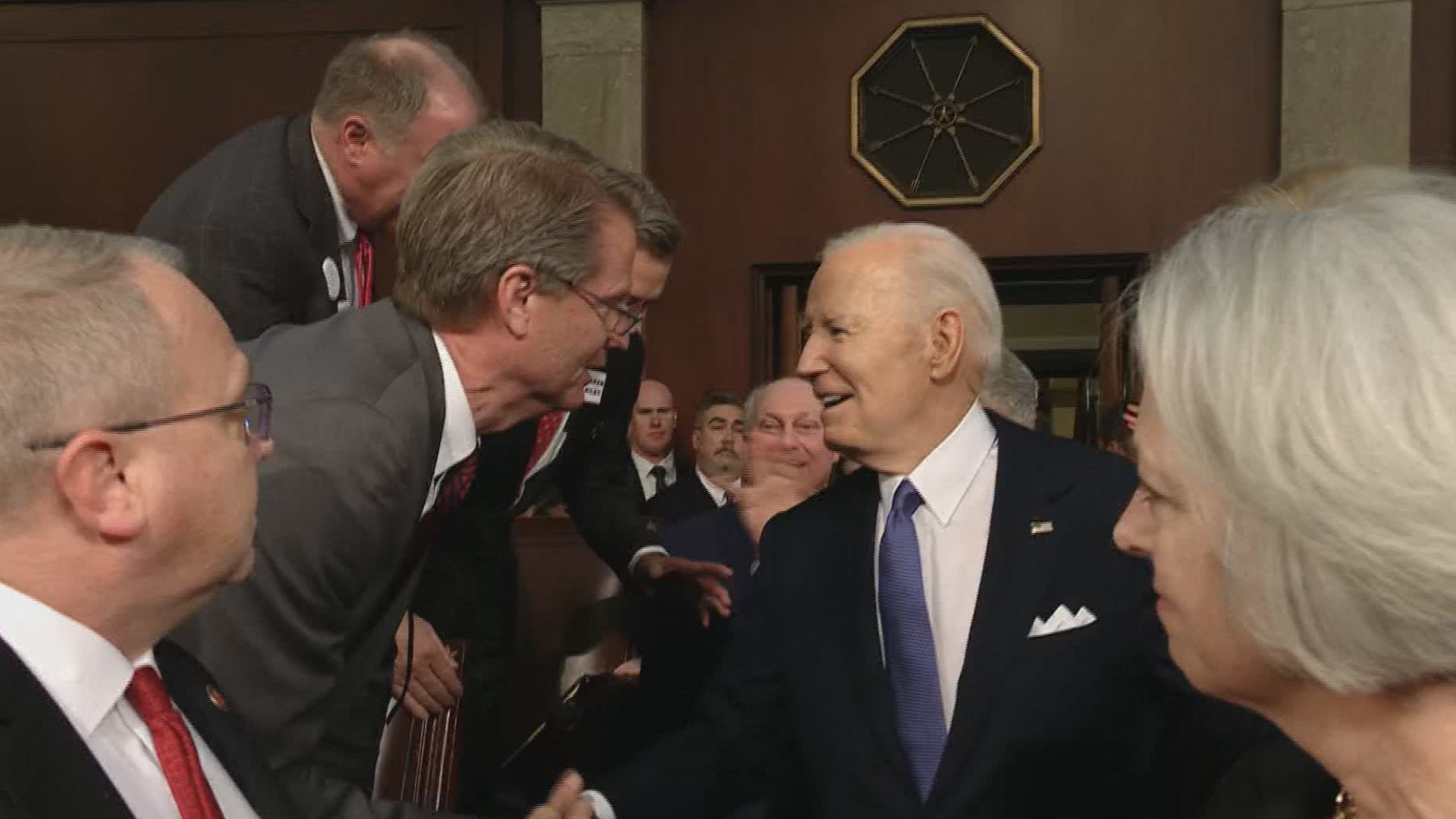 As the President walked to the podium, the two had a 30-second bipartisan exchange about... ice cream and Corvettes. Seriously. That's what Burchett's office said.