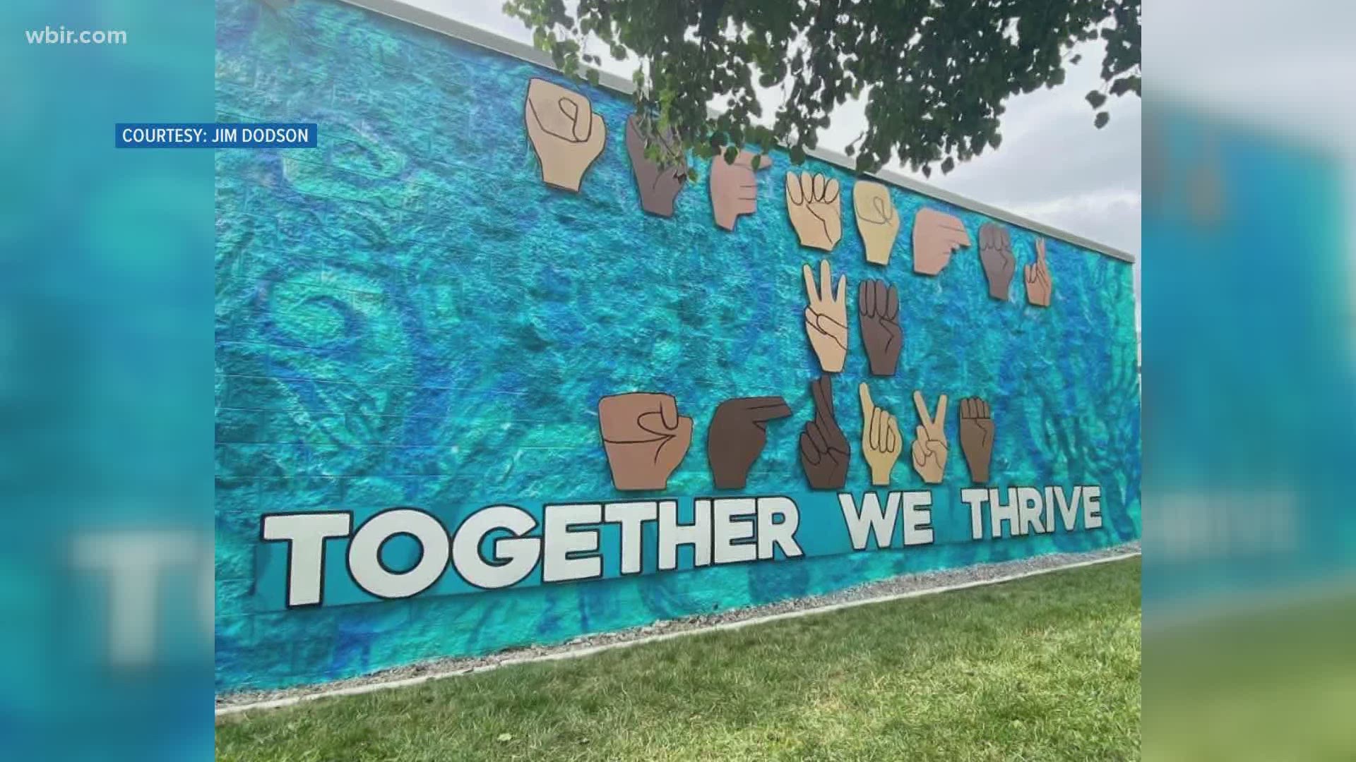 Jefferson Middle art teacher Jim Dodson shared these photos on Facebook of the "together we thrive" mural.