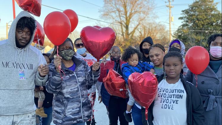 Loved ones and community activists hold a vigil Monday to honor a man who died in police custody