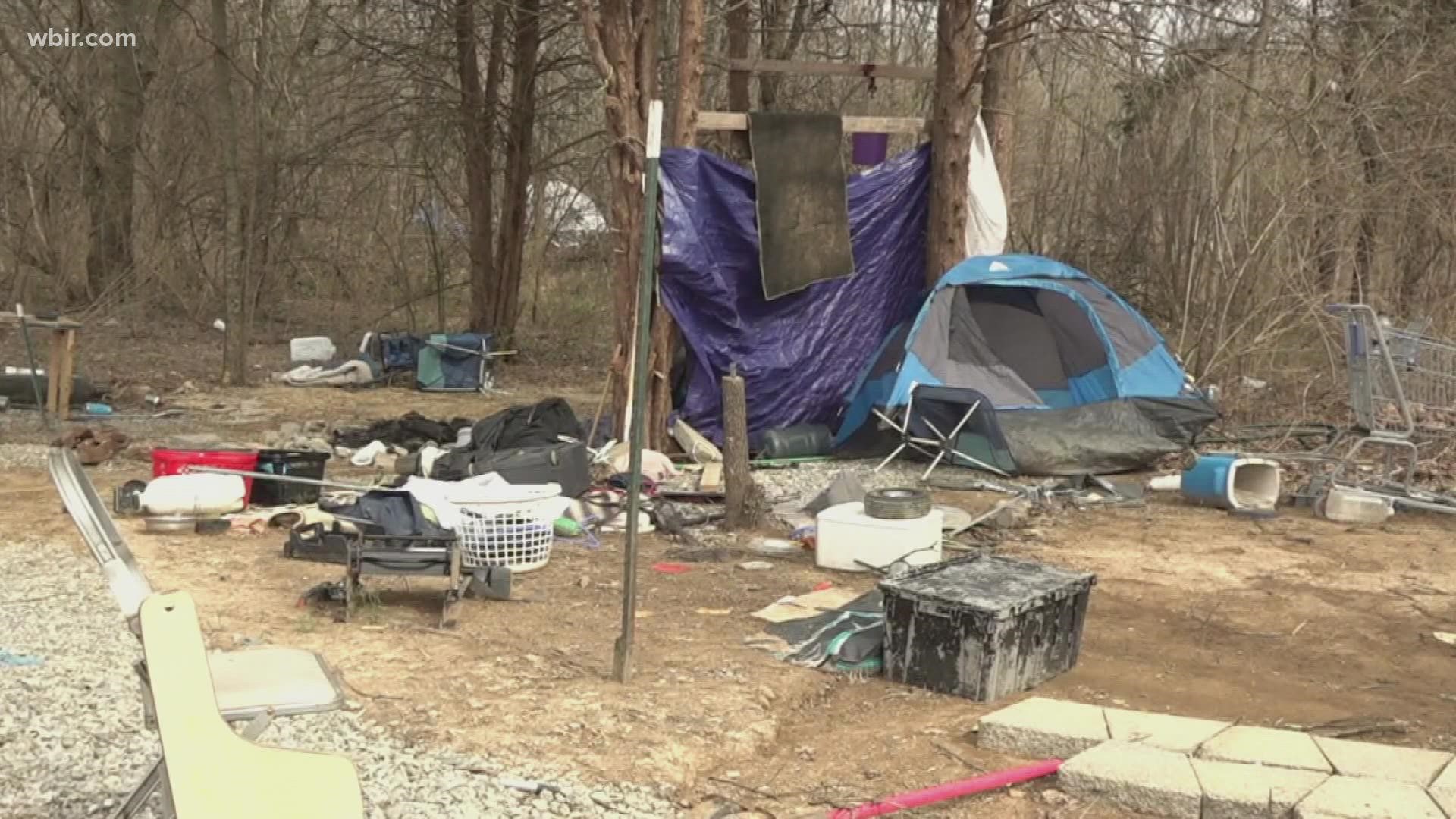 As more camps start to pop up in Knox County, officials say that homeless people are further away from resources that could help them.