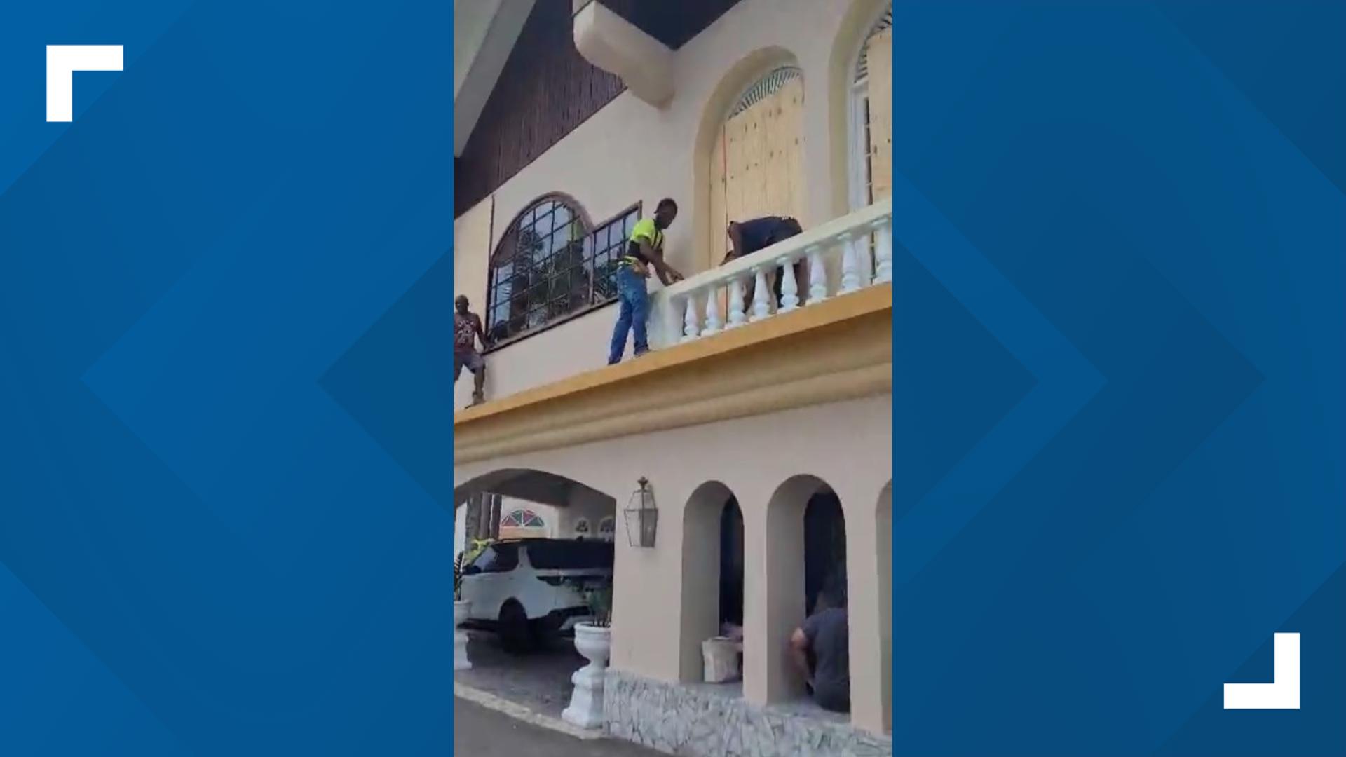 Crews are boarding up windows at a resort in Jamaica before Hurricane Beryl passes through.