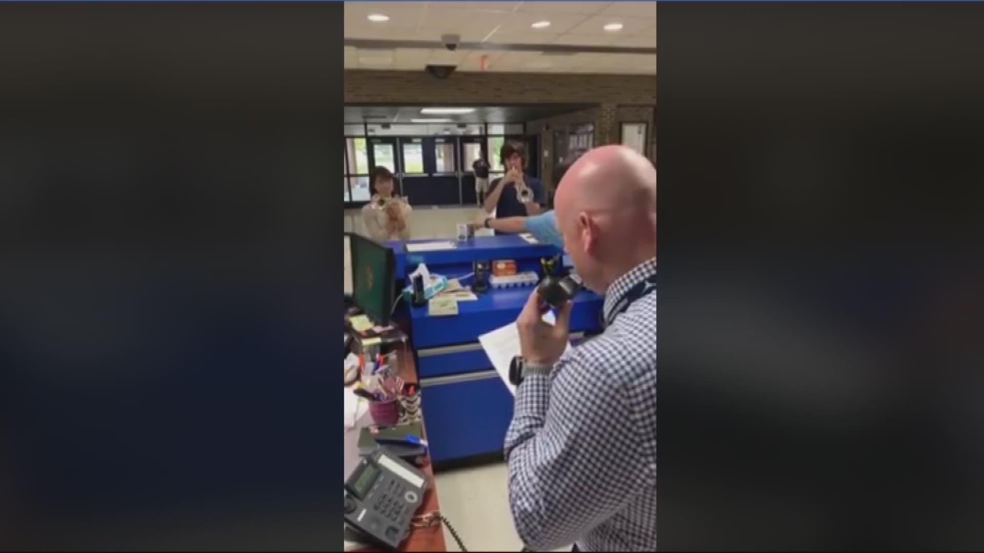 In a video posted to Facebook on Wednesday, one of Anderson County High School's assistant principals started the day by powerfully reading the timeline of events from that fateful day over the school's speaker system.