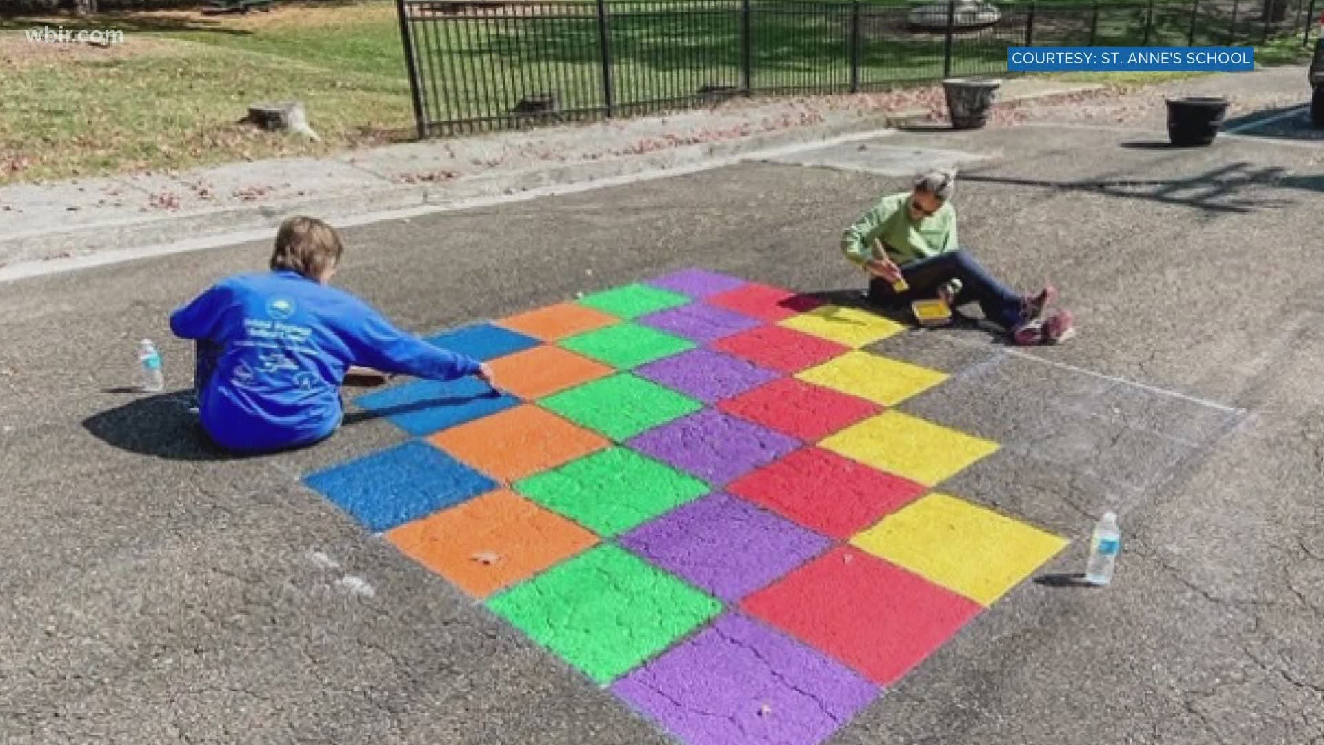 There are all kinds of designs on the asphalt from a big dragon to a colorful hopscotch space.