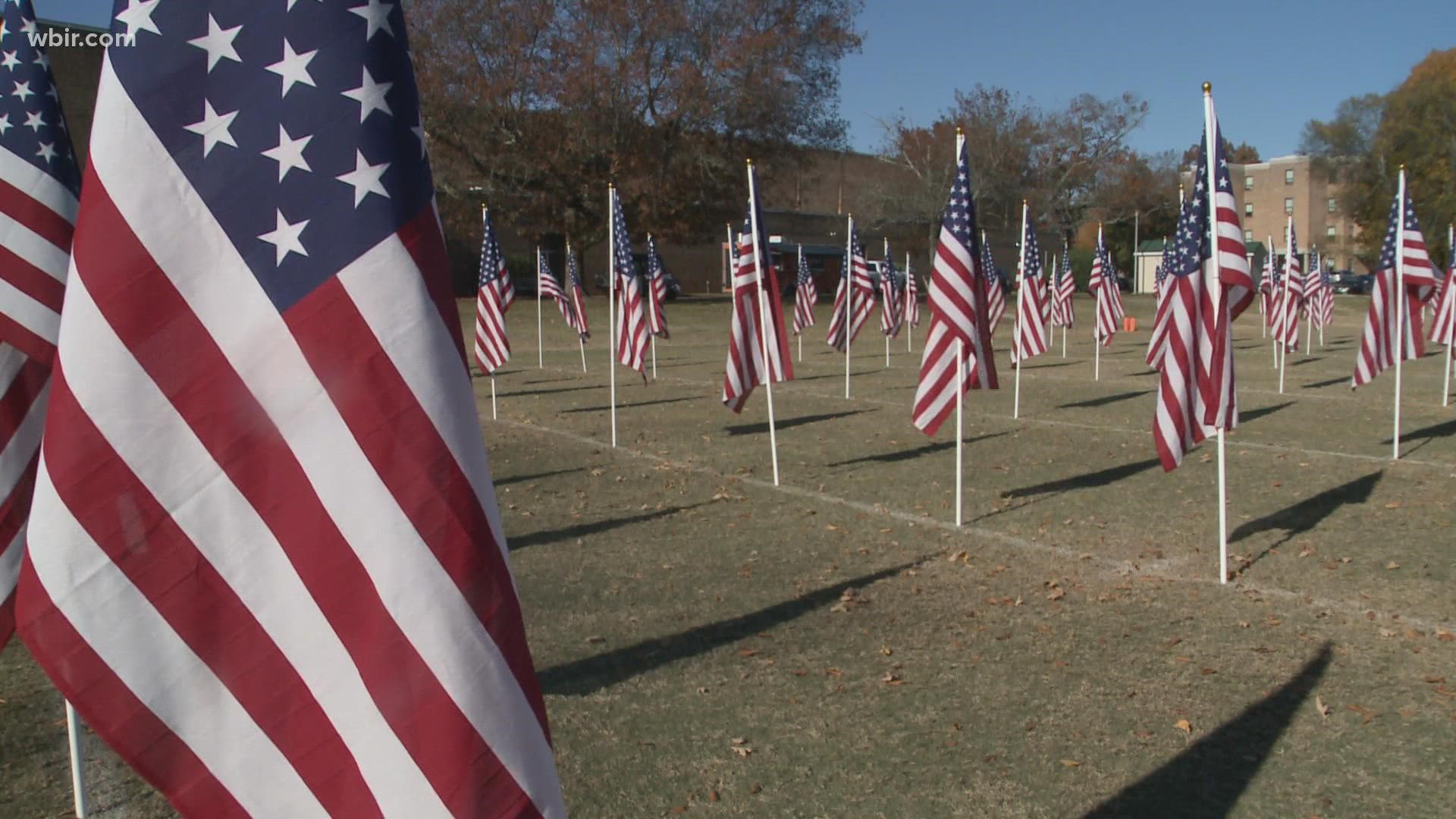 Flags were placed near Maryville College's practice field and flown in formation. Each flag represented a veteran.