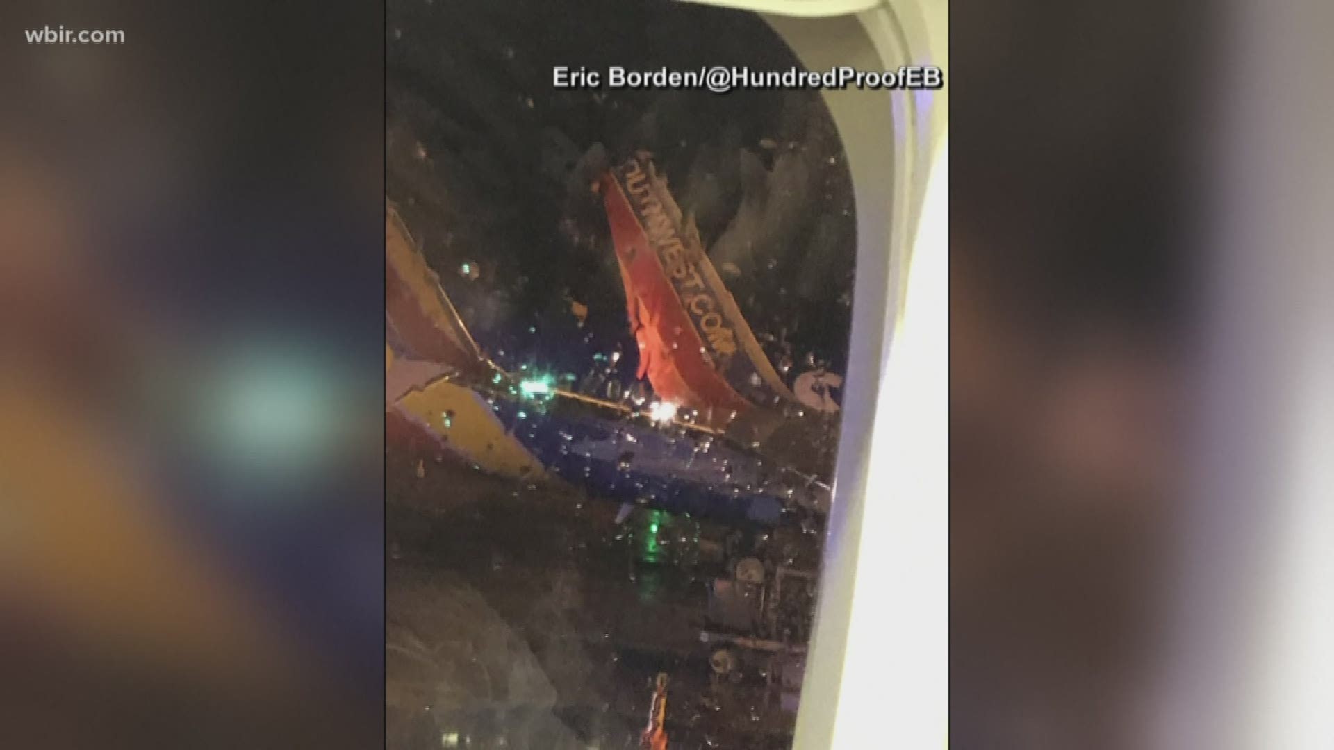 A photograph provided by a passenger onboard the flight to Atlanta showed rainy weather and what appeared to be the top of the other plane's fin clipped off.