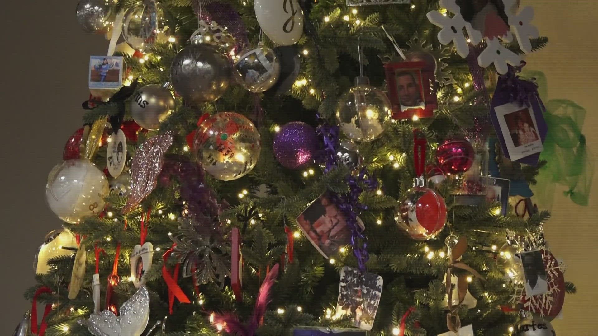 People brought an ornament to be placed on the Victims Remembrance Tree for their loved ones.