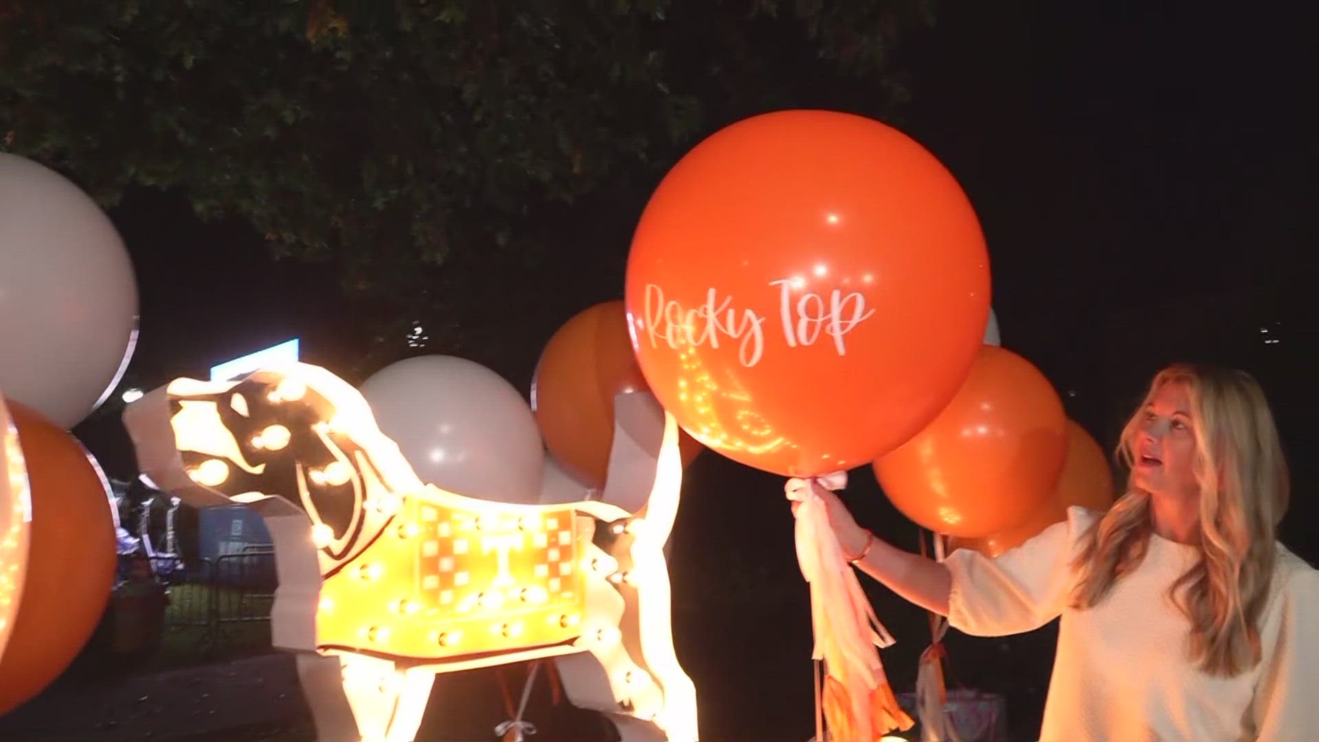 You can't forget about the Vols decor! Balloon Garden's Ashley Reed and Colleen Martin show off some orange-tastic decorations.