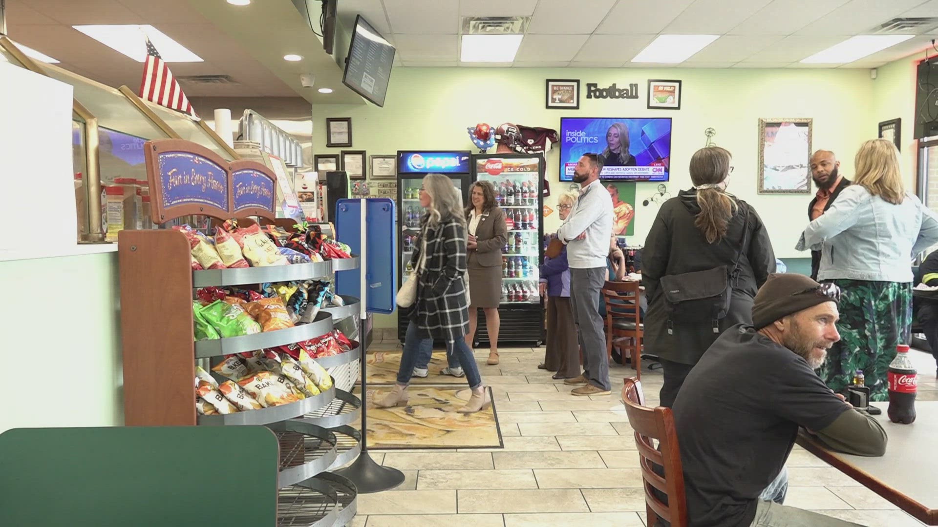 On Wednesday, a surge of new and long-time customers surprised the owners of "Time Out Deli."