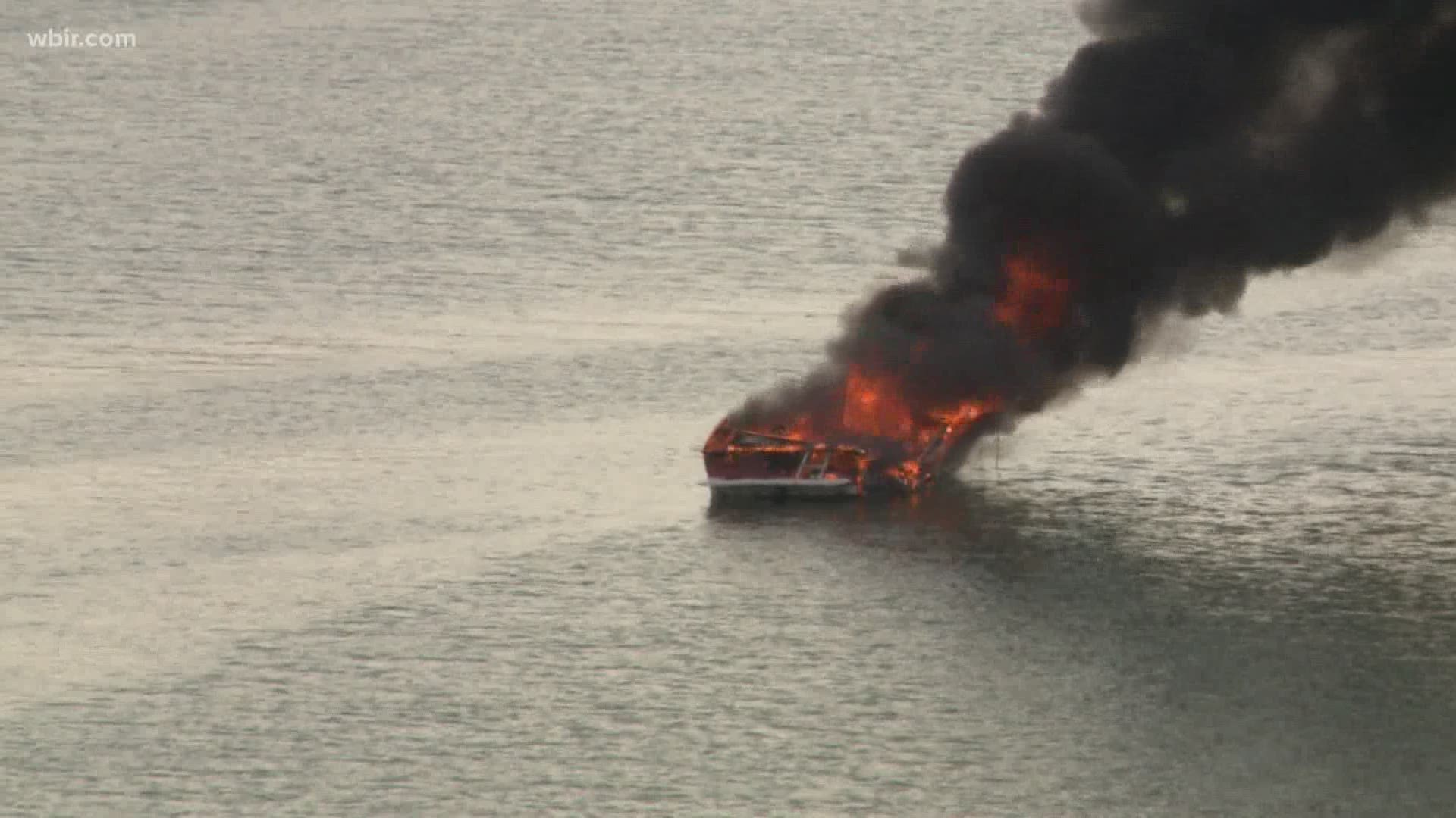 THE KNOXVILLE FIRE DEPARTMENT SAID TWO PEOPLE WERE ON BOARD THE BOAT WHEN THE FIRE STARTED.