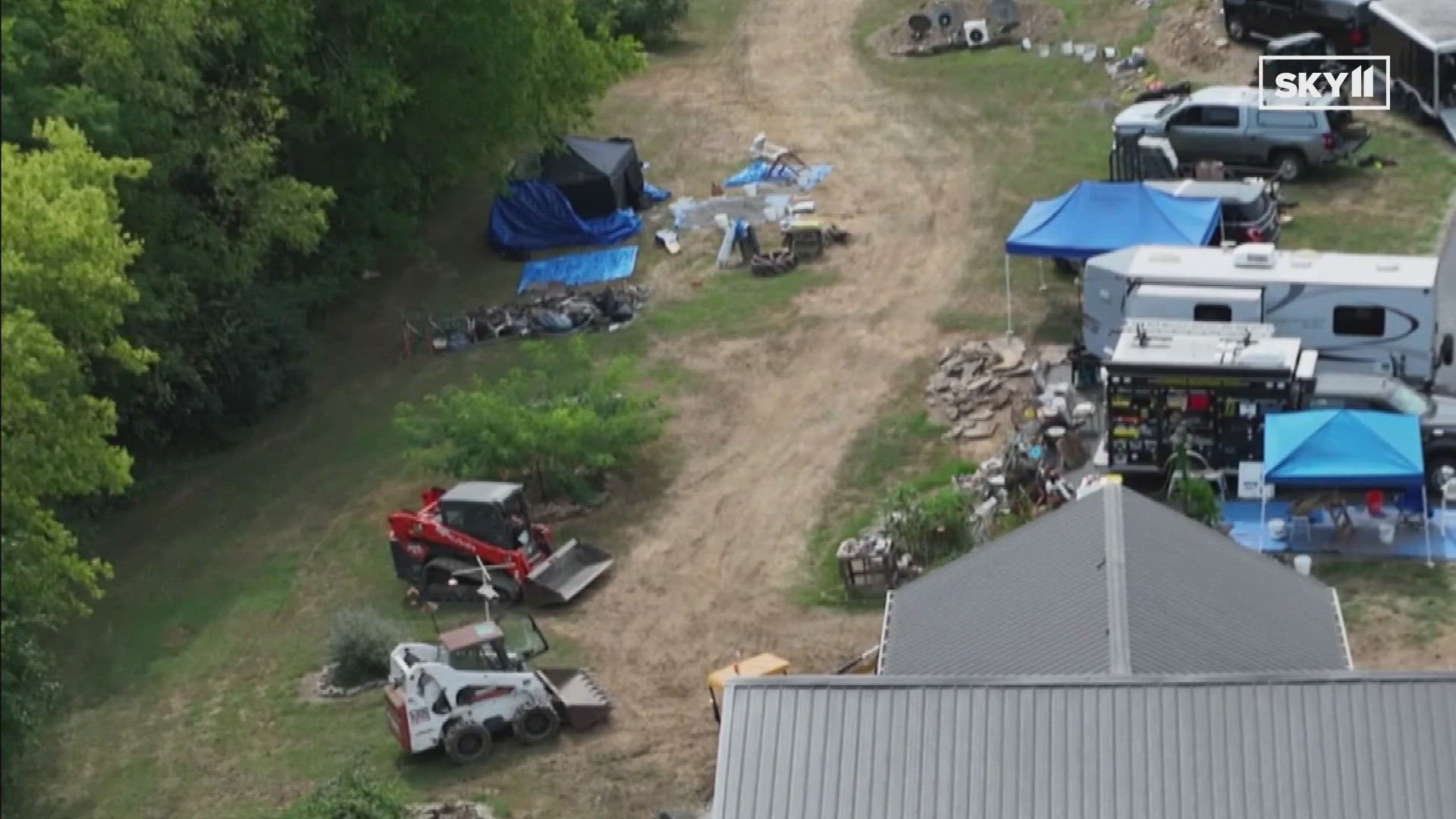 In the last hour, we've seen several SUVs, trucks and trailers leaving that search site in Cox's Creek.