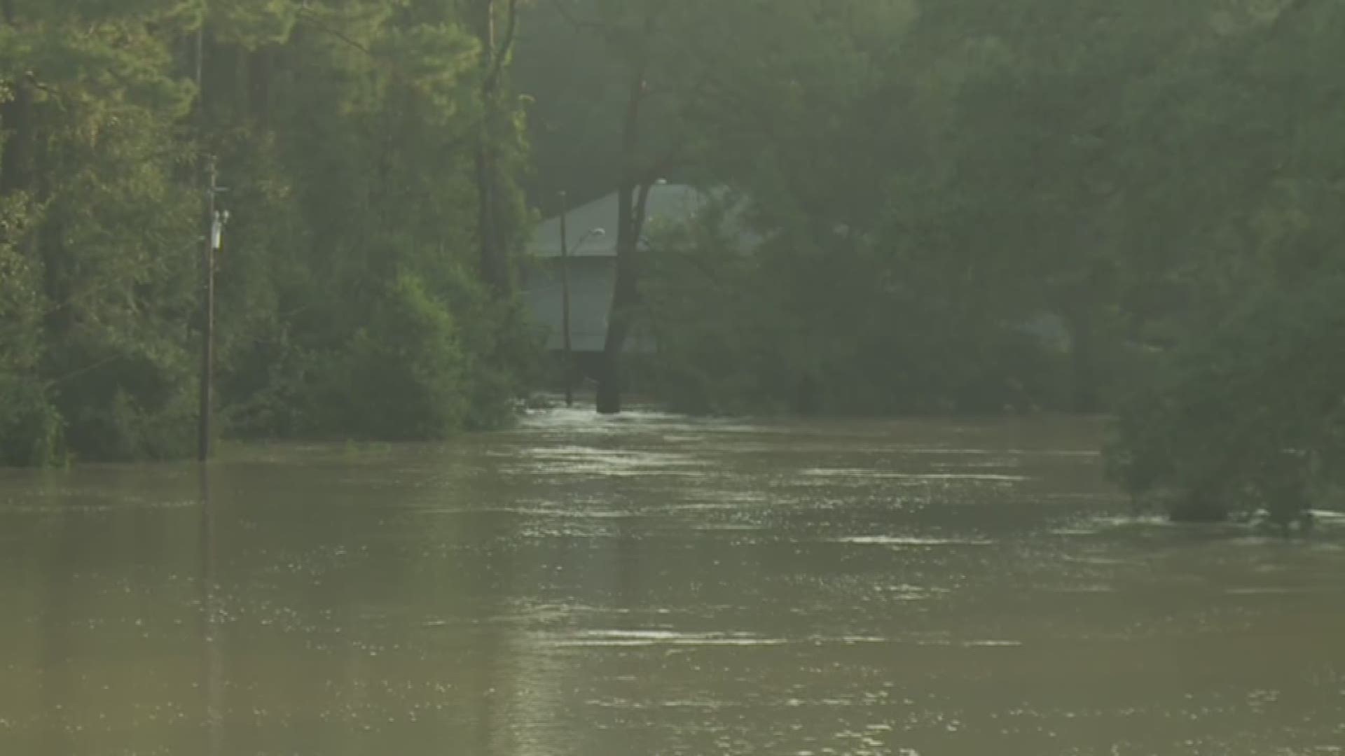 The Amite River has been going down, but not much. Mike Hoss has an update from Hwy 190 overlooking the river. 